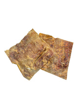 Naturbelassene Rinderkopfhaut Kausnacks von gourmetpfoten.de für die natürliche Zahnpflege und Beschäftigung von Hunden